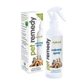 A bottle and box of pet calming spray on a plain white background. The product is labeled 'pet remedy natural calming spray' with images of a dog, cat, and puppy on the packaging.