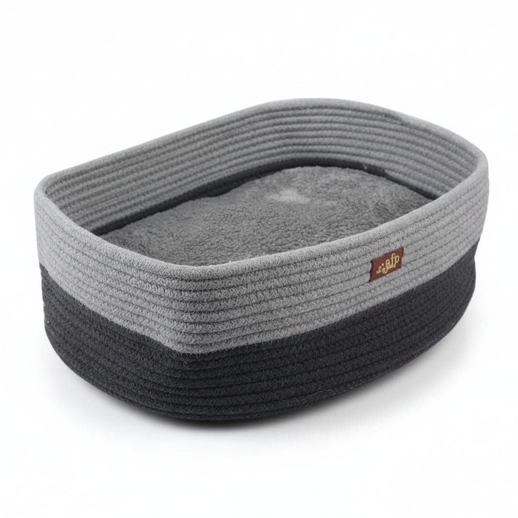 A gray and black rope pet bed with a soft gray cushion inside, shown with dimension lines and measurements indicating 30cm by 42cm by 14cm.