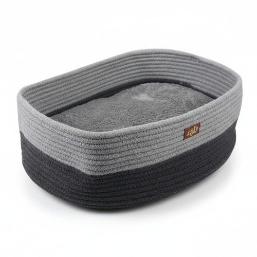 A gray and black rope pet bed with a soft gray cushion inside, shown with dimension lines and measurements indicating 30cm by 42cm by 14cm.
